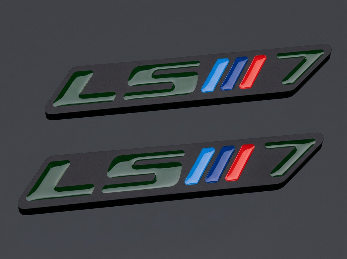Finished LS X Dct 7 speed emblem pair with green letters and blue and red stripes