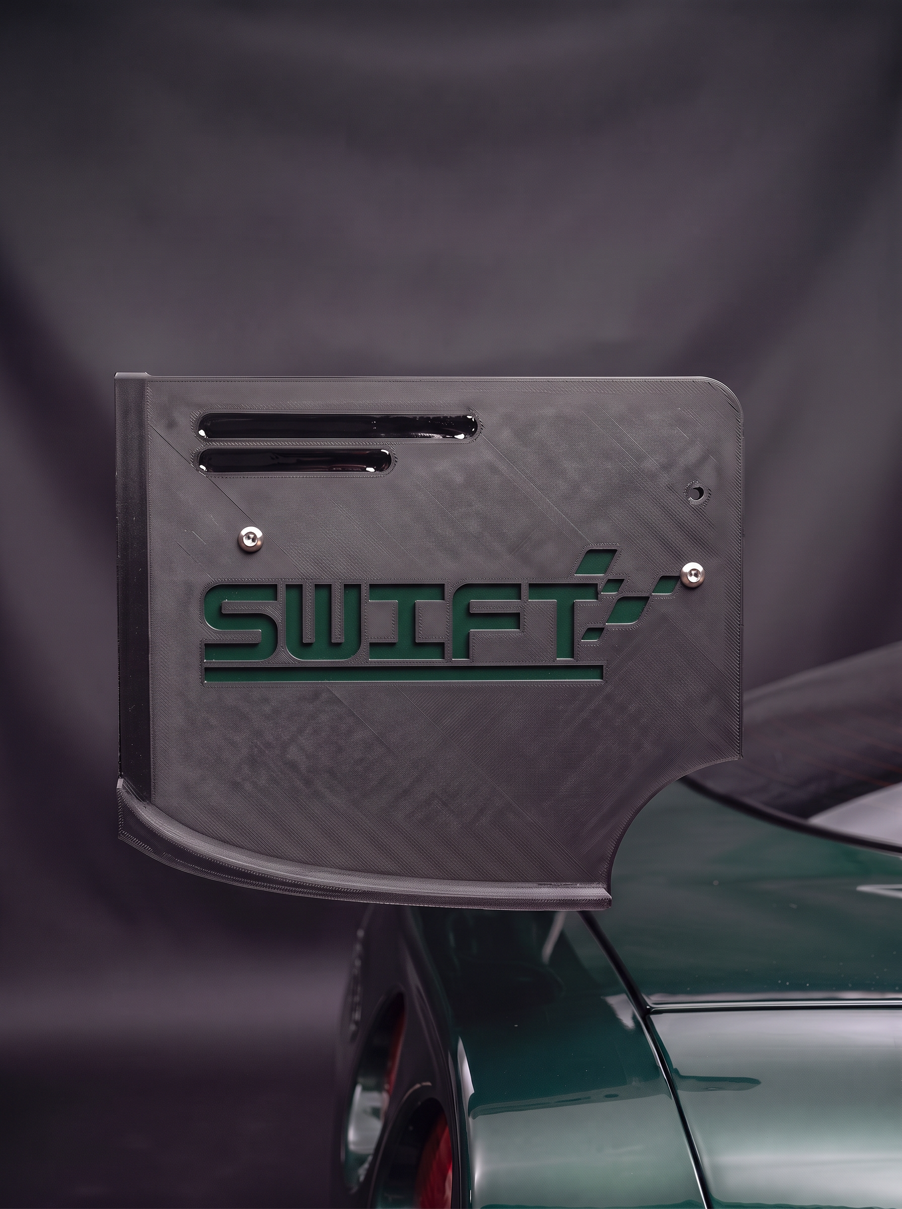 Custom wing end plate with engraved Swift logo